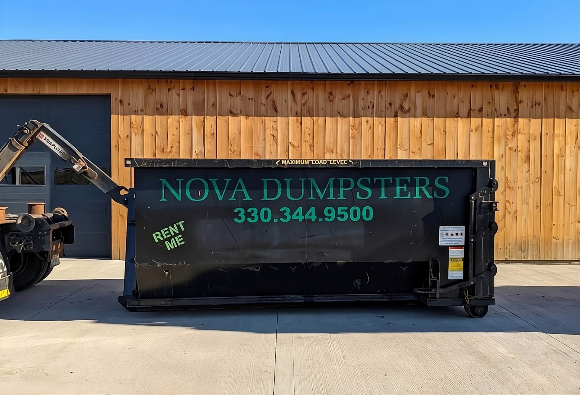 Nova Dumpsters 20 yard roll-off bin at the yard