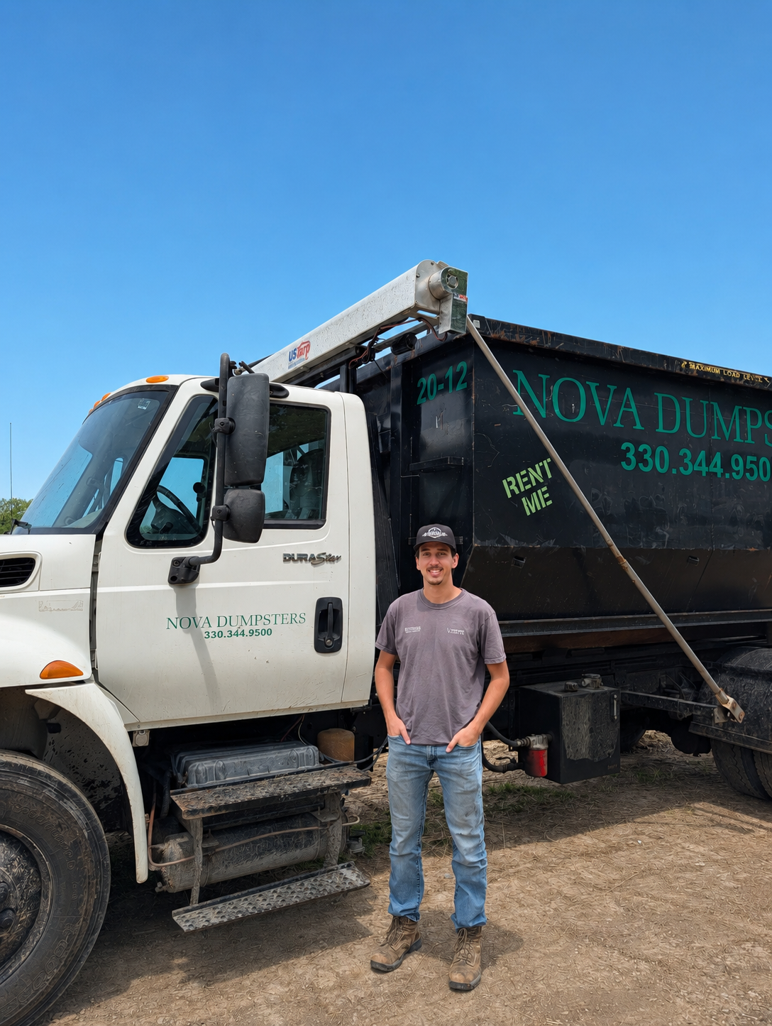 Nova Dumpsters owner standing in front of a company roll-off truck in Ohio