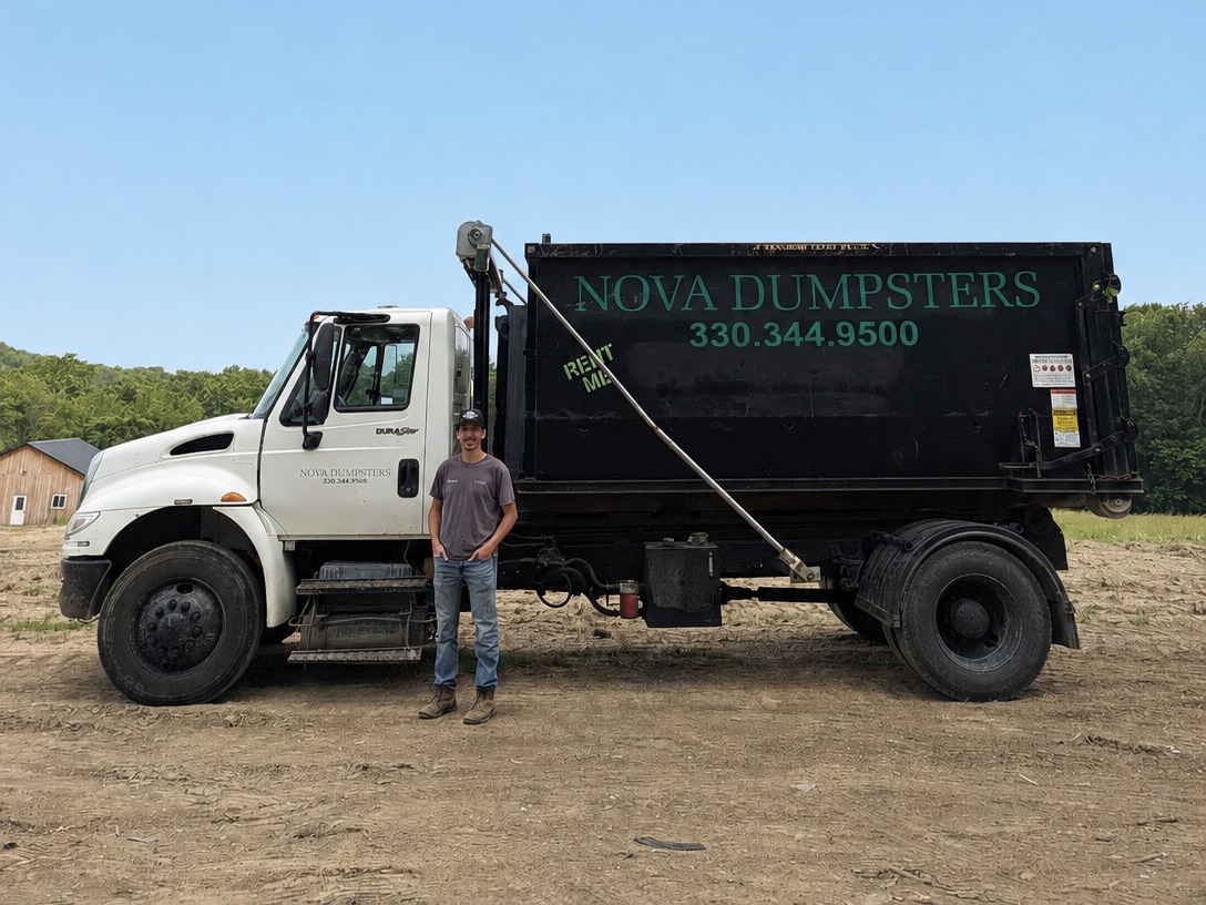 Nova Dumpsters owner standing in front of a roll-off dumpster truck in Ohio